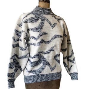 Weathered blues vintage sweater excellent condition.No size tag see measurements